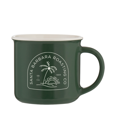 Green Kindle camp mug with a cream rim and the arched palm tree Santa Barbara Roasting Co logo